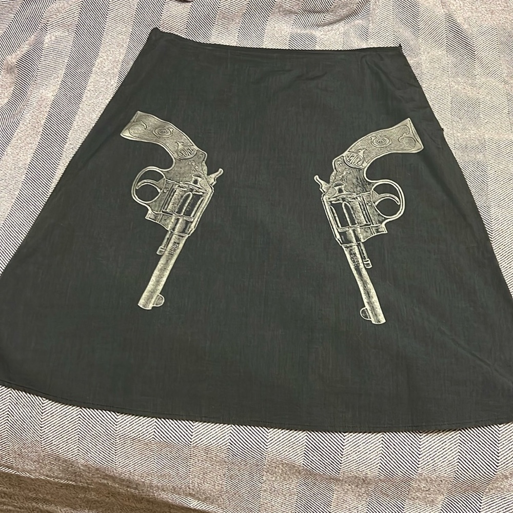 Blue A Line skirt with pistols